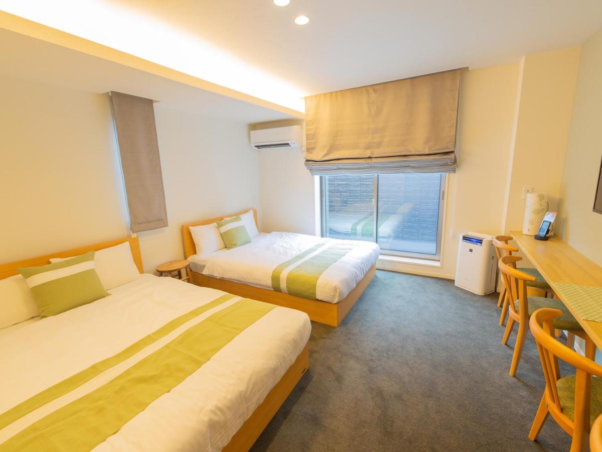 Grand Base Hiroshima Ekimae Aparthotel Exterior foto