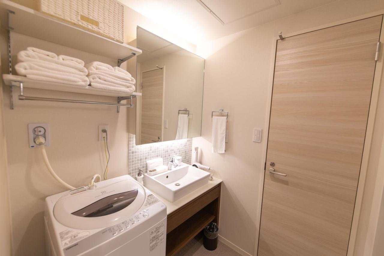 Grand Base Hiroshima Ekimae Aparthotel Exterior foto
