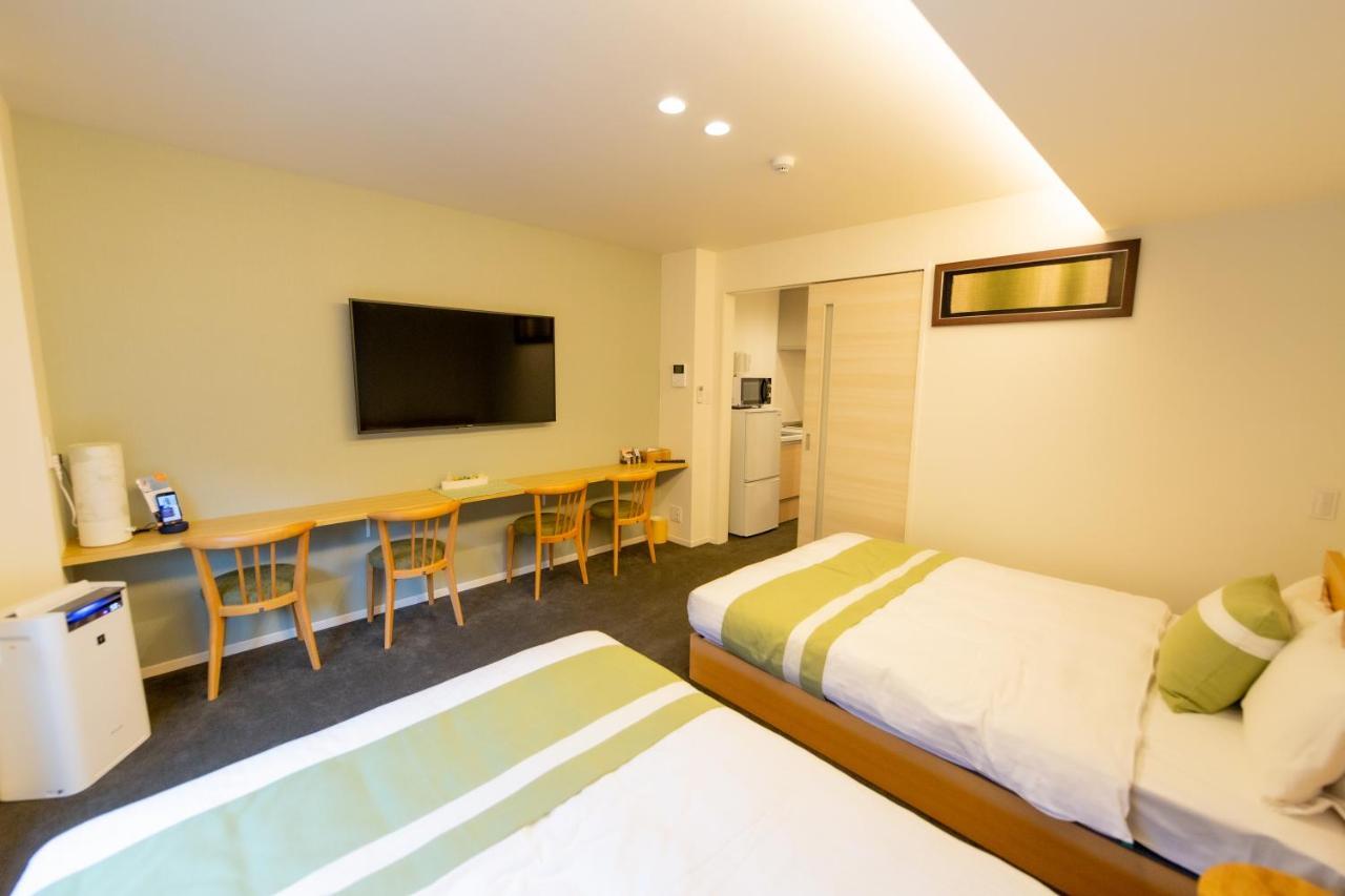 Grand Base Hiroshima Ekimae Aparthotel Exterior foto